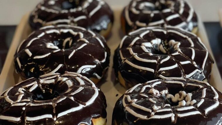 Chocolate donuts by cafe de siesta. Donuts before anything else.Order now.