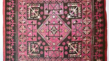 This unusual embroidered design from the is actually a cloth for bread. “The r