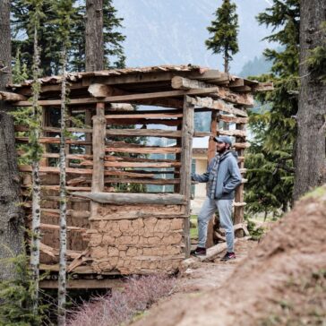 A cabin far away from people and stress. A little snow, a warm cup of coffee and